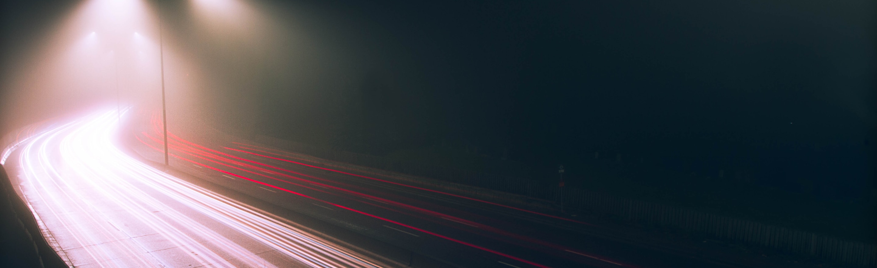 Long exposure of nighttime traffic seen from above